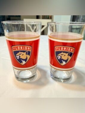 Florida Panther's and Hard Rock drinking glasses (2). 16oz